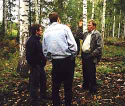 Director of the Kosikhinskiy leskhoz M.V. Kondratovich showing his forestry to the experts
